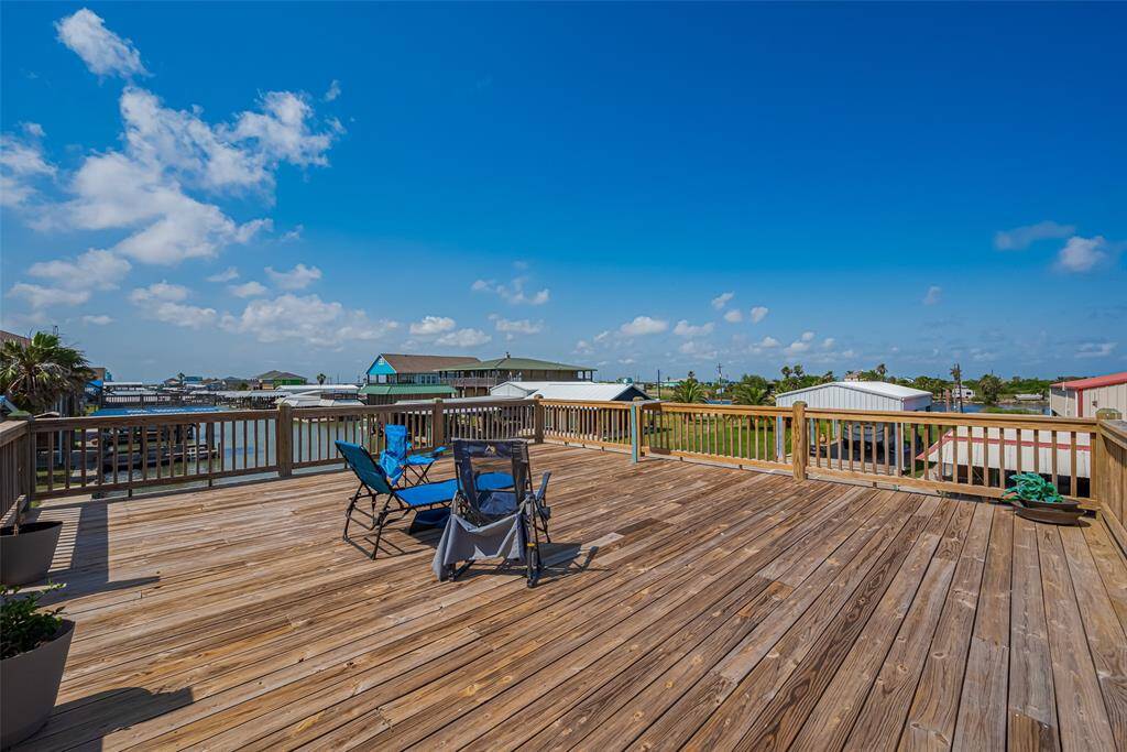 Beautiful canal front deck off of the main living area.