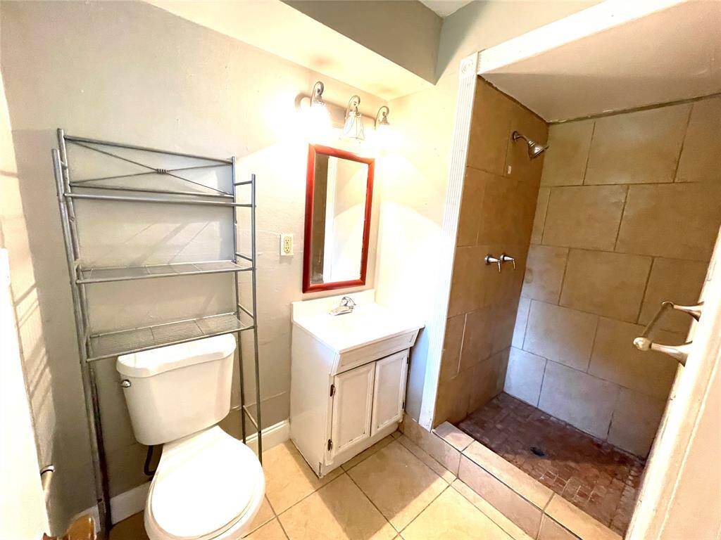 Bathroom with modern sink and fixtures.