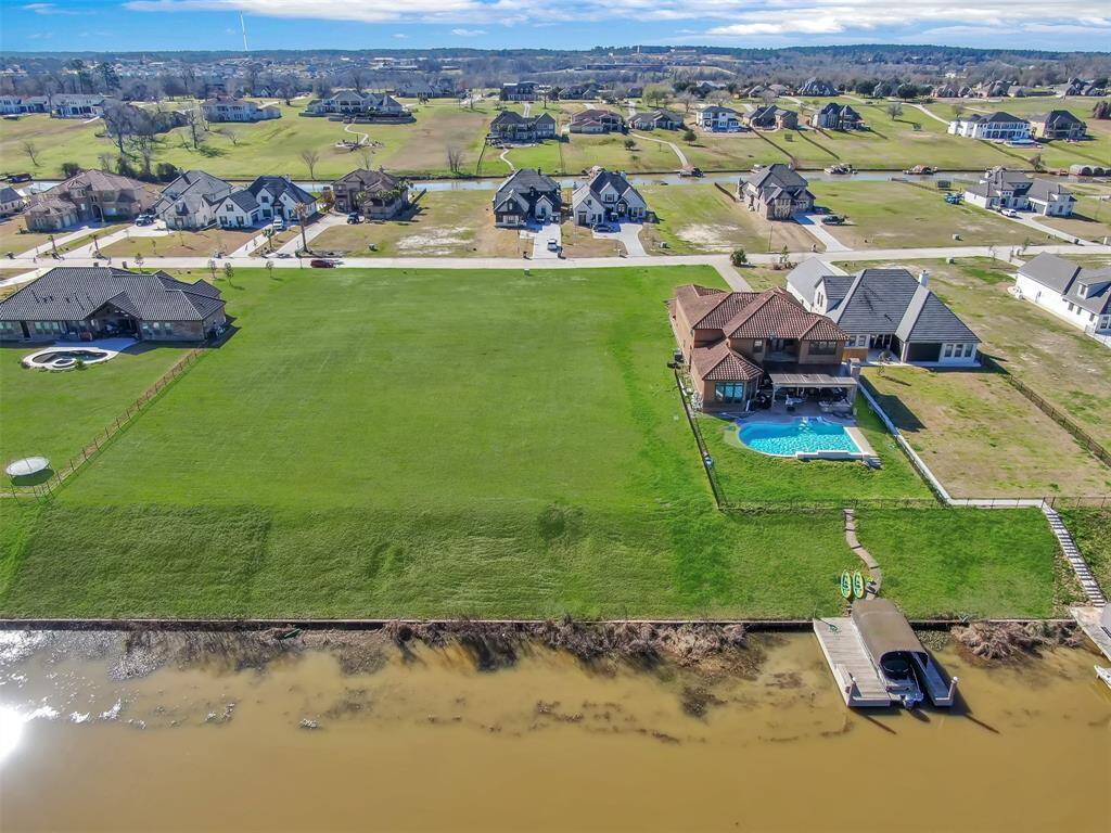 The surrounding area features a suburban setting with similar residential properties.