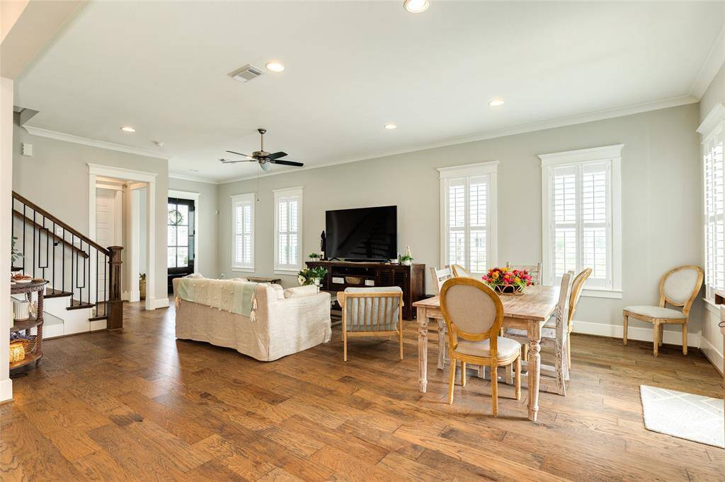 Very open living and dining space.  Windows all have plantation shutters.  Great space to entertain in.  Gorgeous wood floors throughout home.