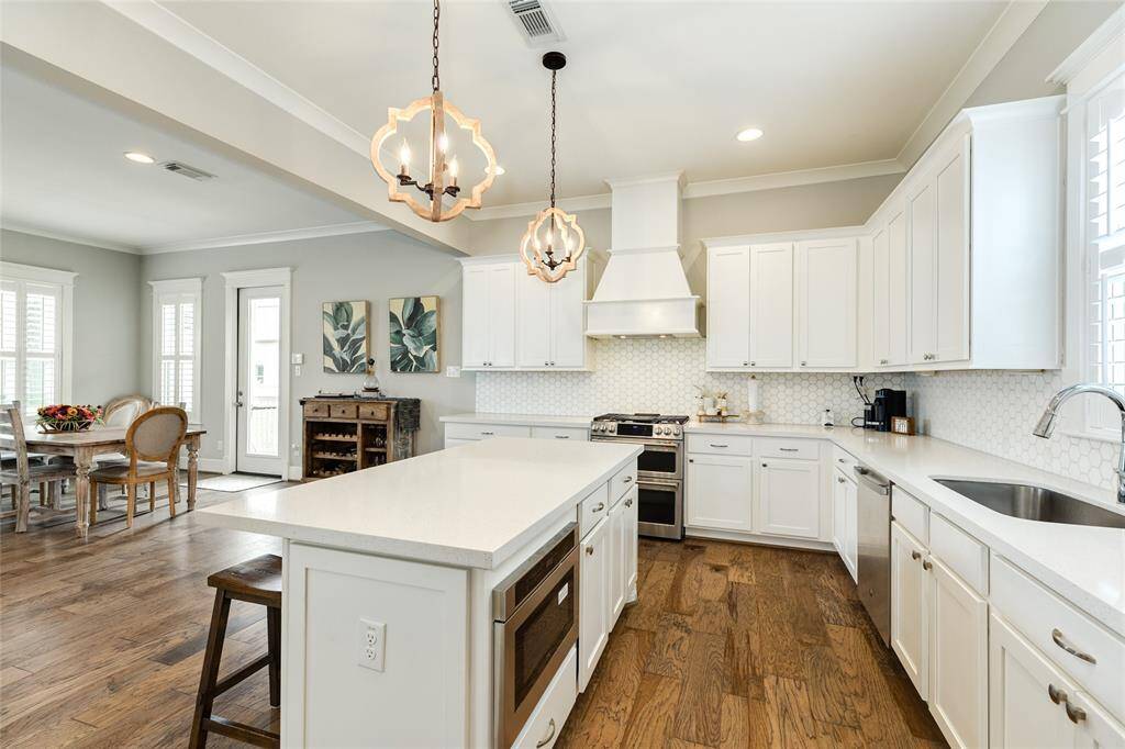 Tons of cabinets, stainless appliances, Cafe gas range, drawer microwave and more.