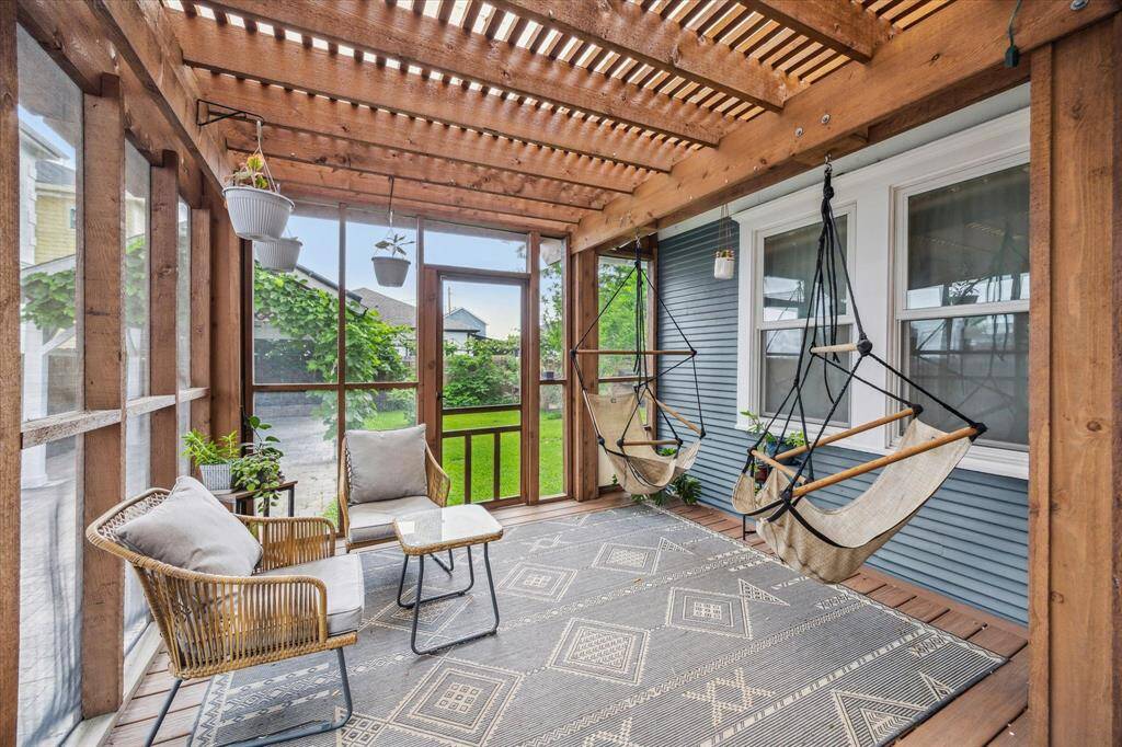 The screened in porch is the perfect spot for relaxing after a day in the garden!