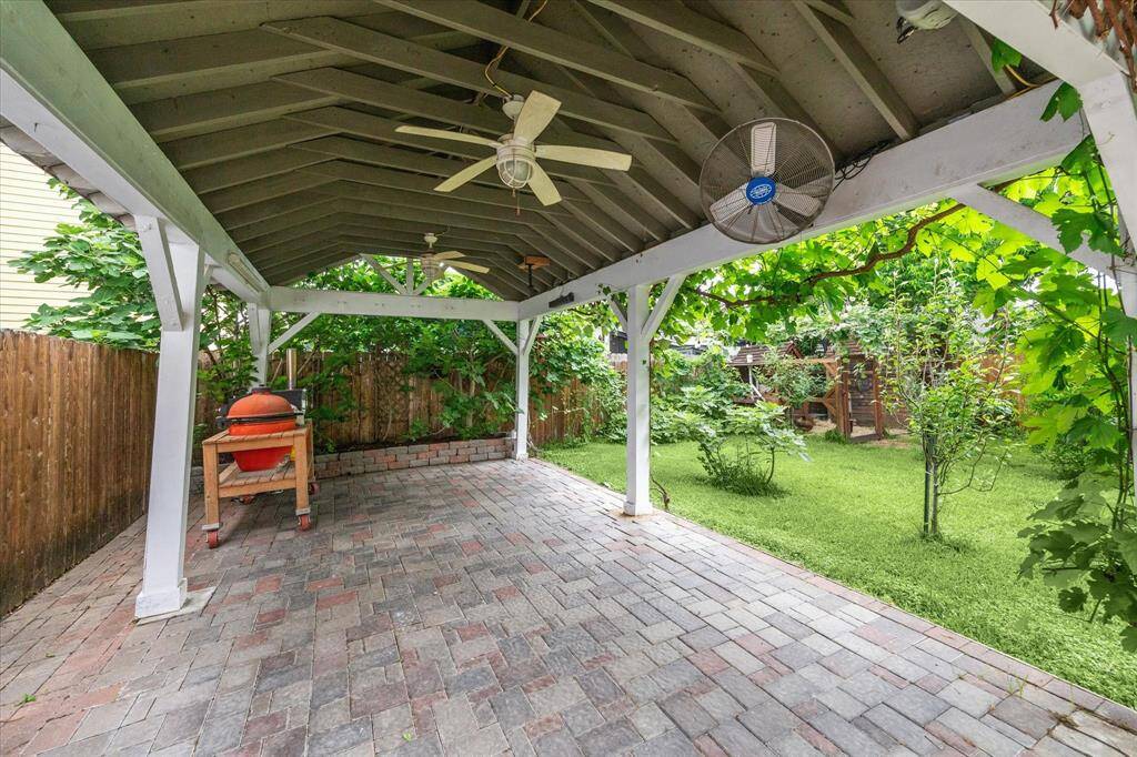 The fully paved and powered carport offers flexibility for parking or extra outdoor living space. It also has 5 long retractable clothes lines if you want to reduce your carbon footprint even more!