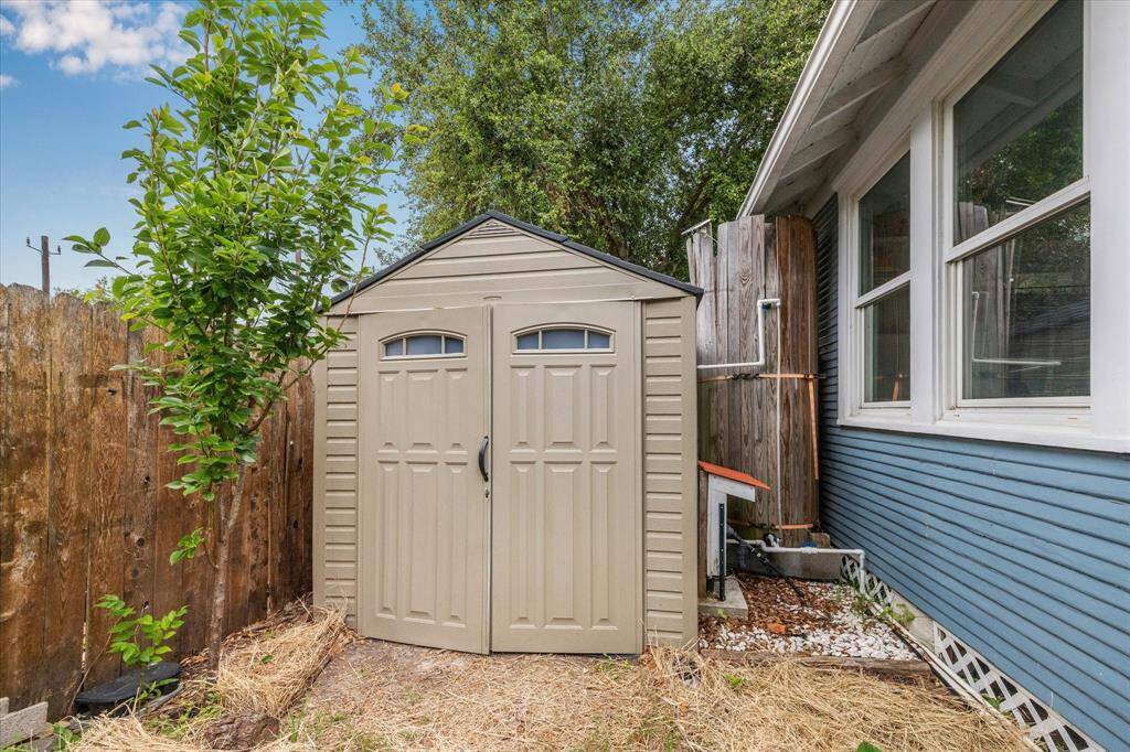 The storage shed will convey with the property.