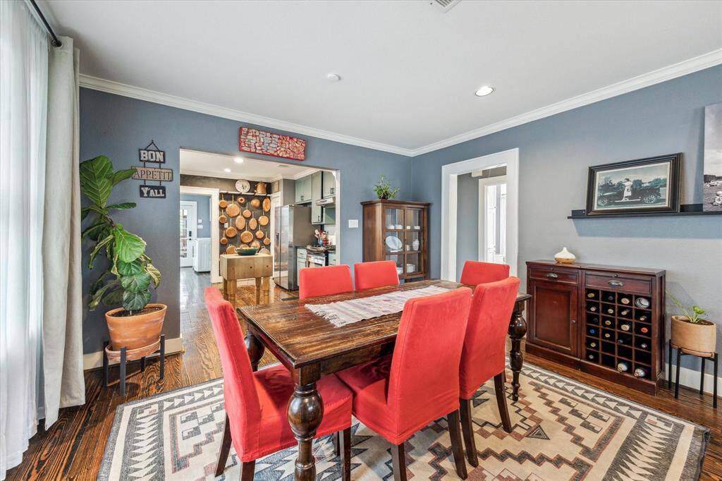 The dining room is conveniently located just off the kitchen, making it perfect for effortless entertaining.