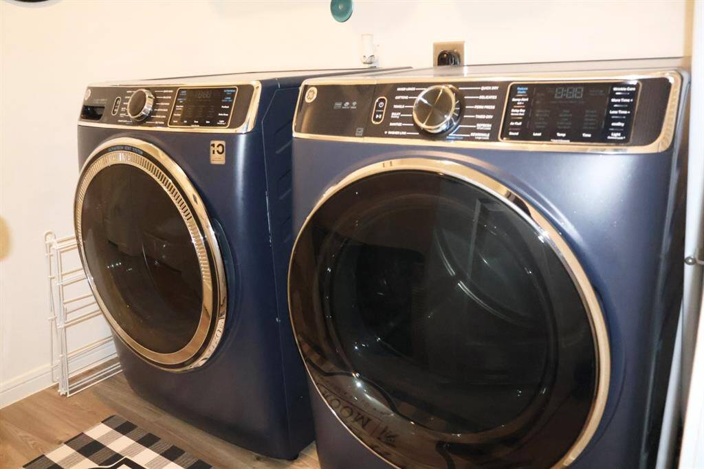 Large utility room has built in shelf for storage.