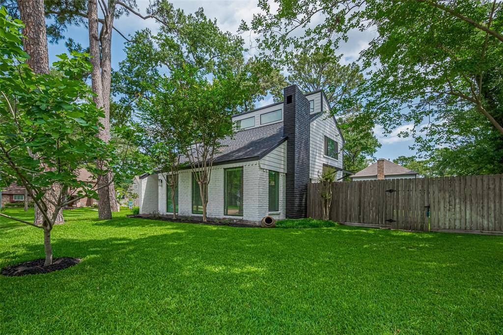 Lush lawn. Right side of home
