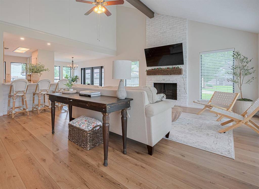 Designer style in this beautiful home! Natural light blankets the living room, dining room and kitchen.