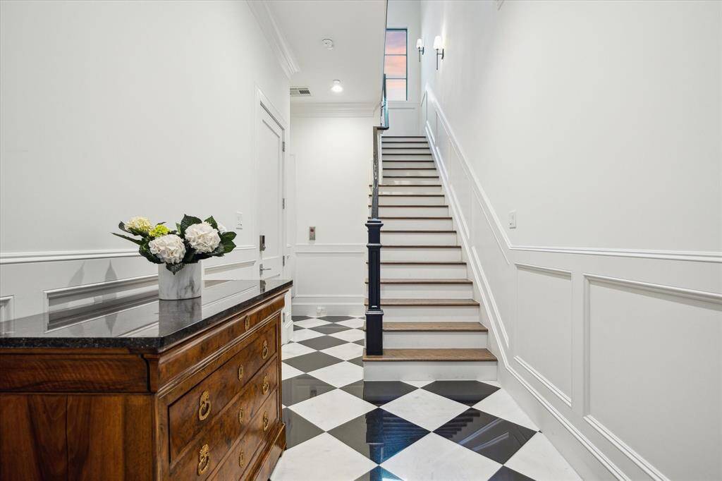 The entry hall welcomes guest in with elegant details.