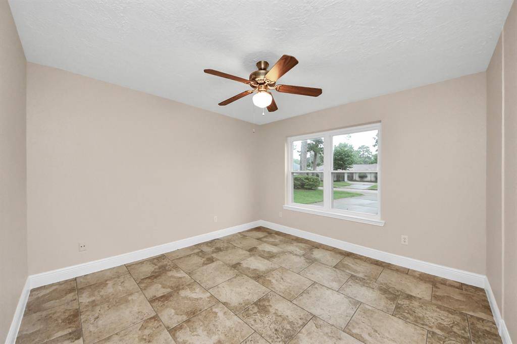 Downstairs front room can be used as an office or playroom