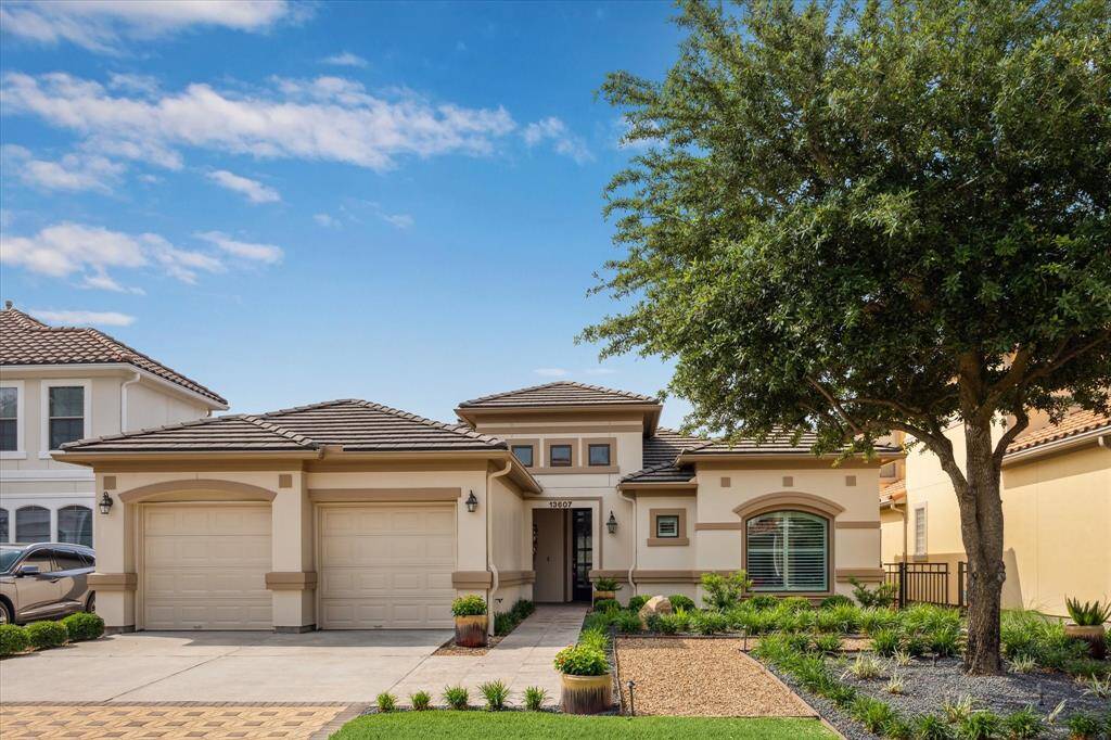 Beautiful one-story home with elegant curb appeal, located on a cul-de-sac featuring a spacious 3-car garage, manicured landscaping, and a welcoming front entrance with architectural details.