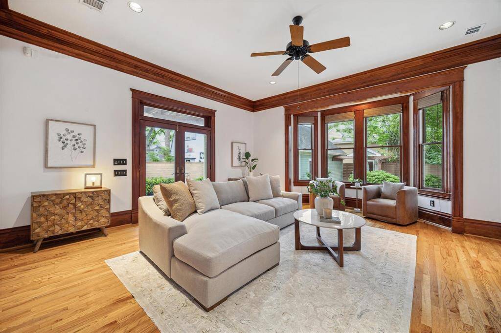 This spacious family room offers the ideal setting for effortless entertaining, with easy flow to the backyard and plenty of room to gather.