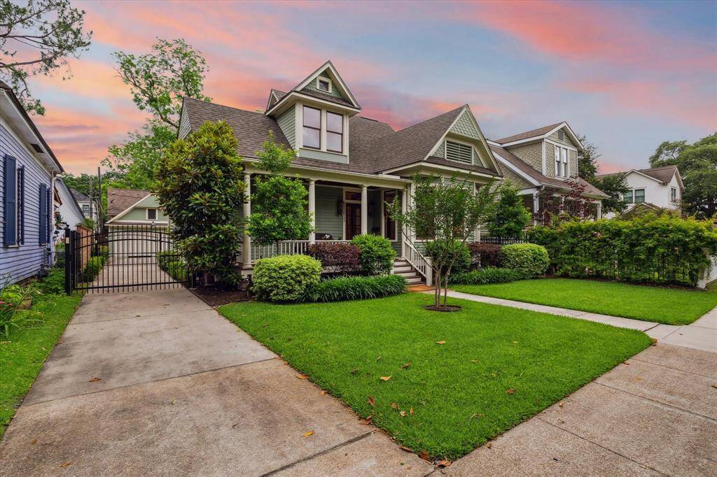 Check out the beautifully landscaped front yard and electronic gated driveway - offering both charm and security.