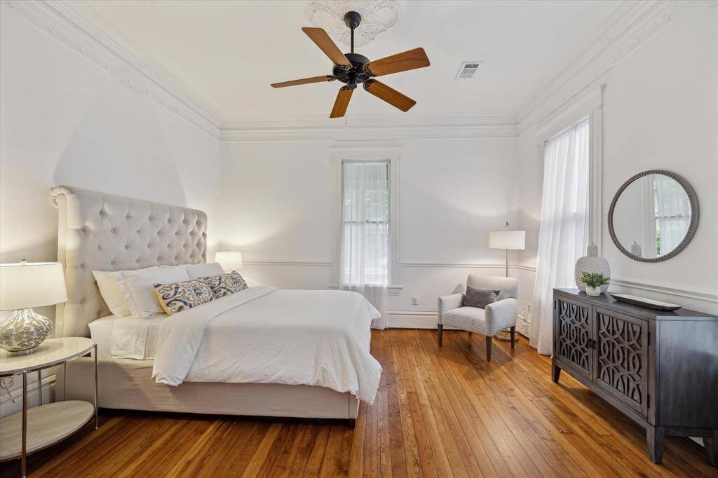 This serene retreat features soft natural light and beautiful hardwood floors.