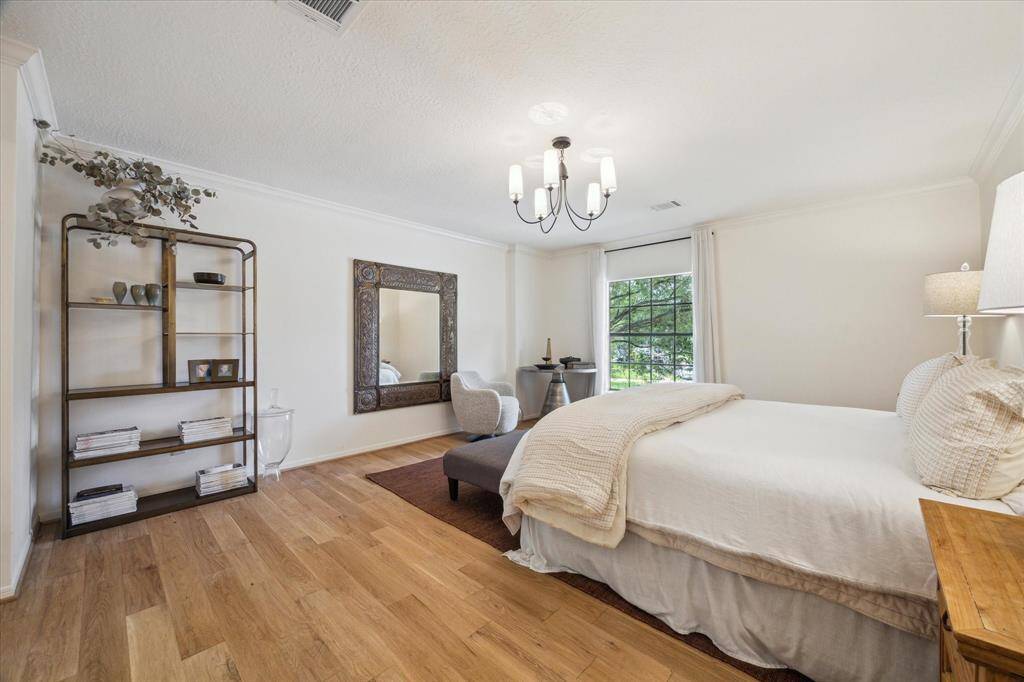 Primary suite has hardwood floors