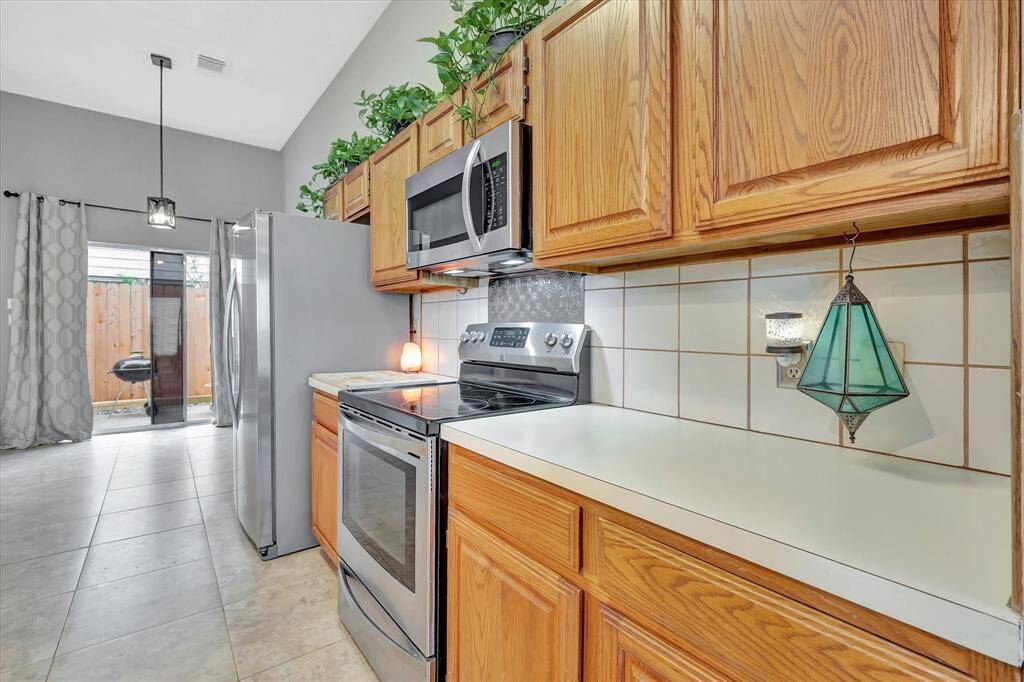Kitchen with stainless steel appliances.