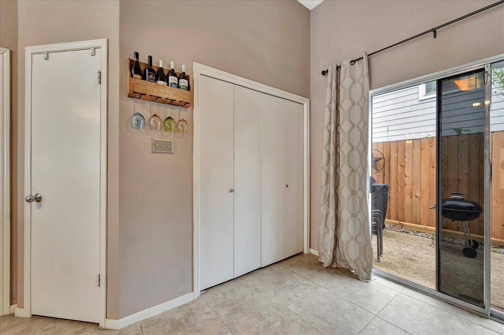 Left door is walk-in pantry. Sliding doors open to laundry.