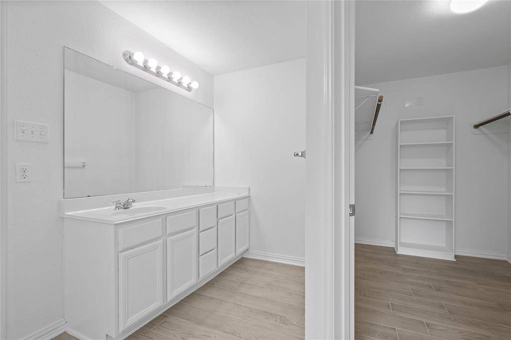 Primary Suite & Back Patio is located directly off the family room.