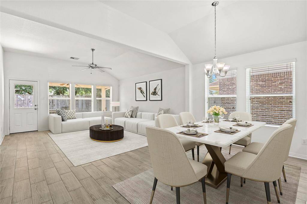 Transform your living experience with this beautiful family room and dining area, offering an inviting and open layout for seamless entertaining. - Virtually Staged for inspiration.