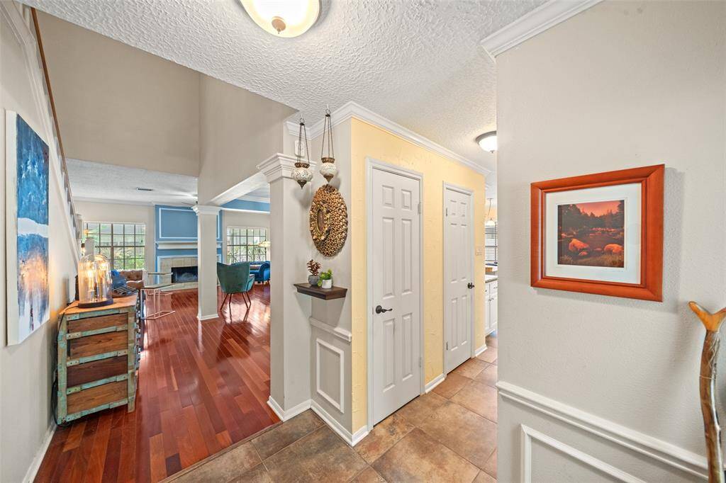 Hallway between Kitchen - Laundry Room on the Right and Half Bath on the Left