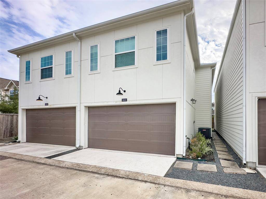 Front of home with side entrance