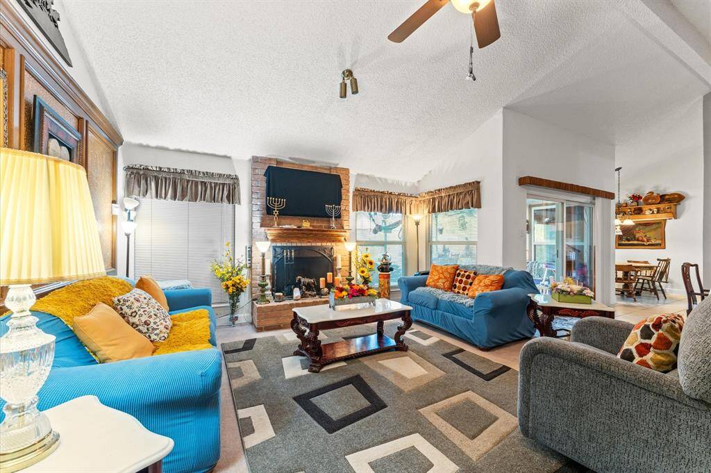 View of your living room from a different angle. Notice all the natural lighting.