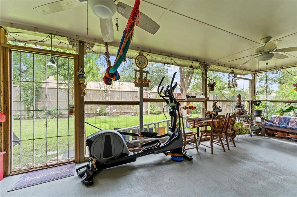 Step out into this relaxing Sunroom with views of your backyard.