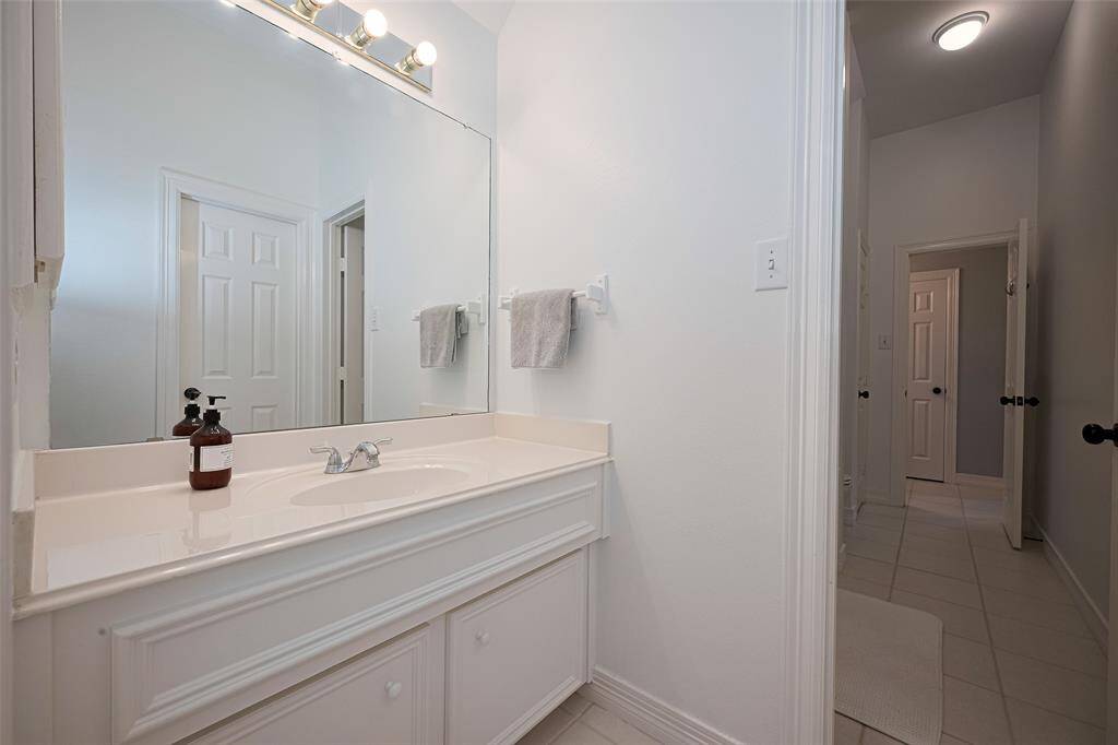 Spacious vanity connects to bedroom #1 upstairs