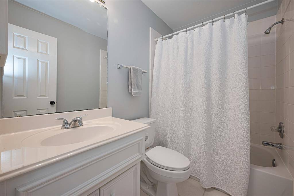 The third bathroom is upstairs and not connected to bedrooms making it private for upstairs guests.  It features fresh paint, tile and a tub/shower combo.