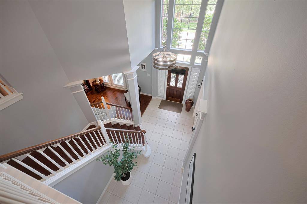 View to the entryway from the upstairs landing.