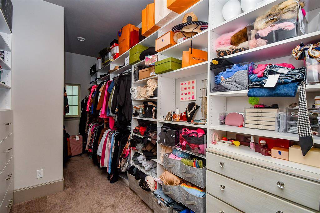 Amazing master closet with built-ins! Utility room is off the master closet!