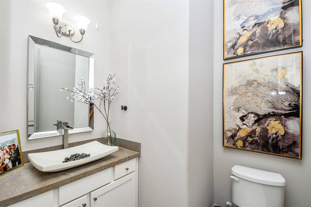 A 1/2 bath with upgraded sink and fixtures!
