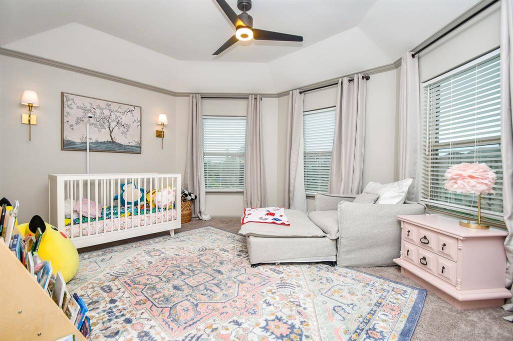 You will love the size of the bedroom 3 with ceiling fans and large windows!