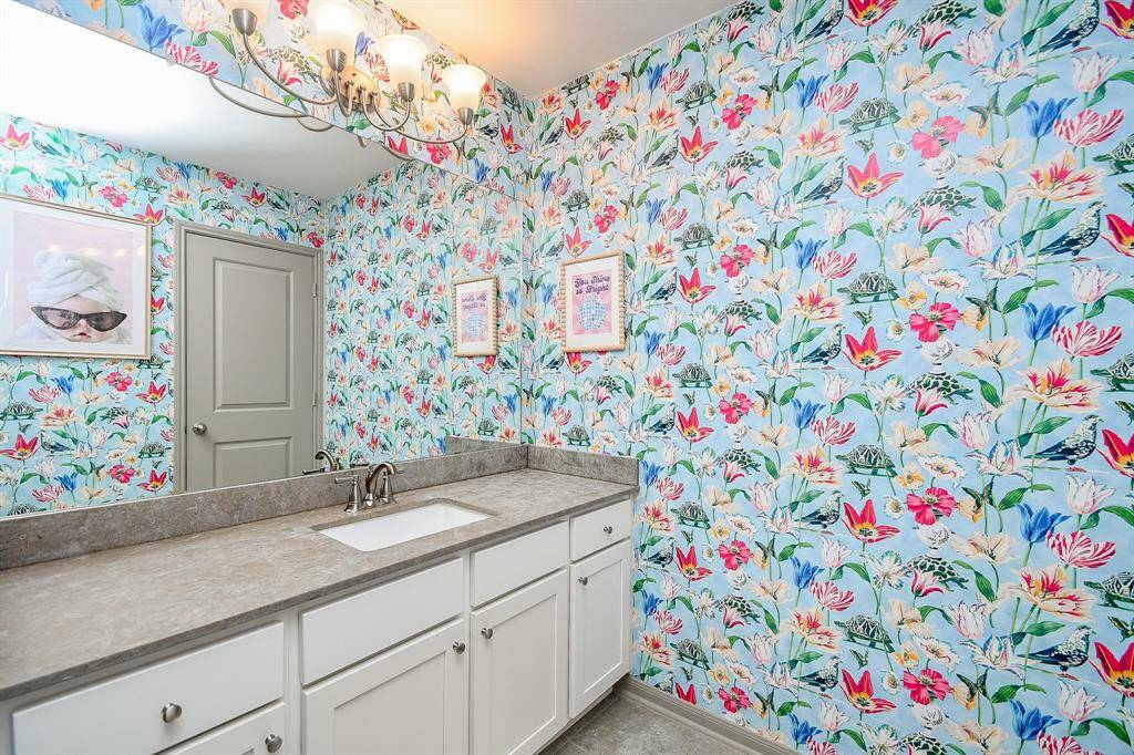 Check out the Bathroom 2 with custom wall paper!