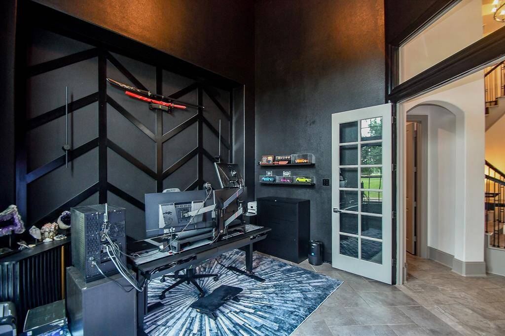 Amazing office with french doors! Huge with room for your large desk and furniture!