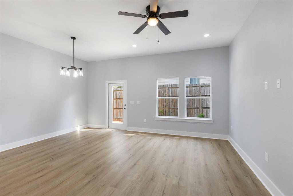 Add your dream sectional to the open living space while watching your favorite movie in front of a large entertainment center.