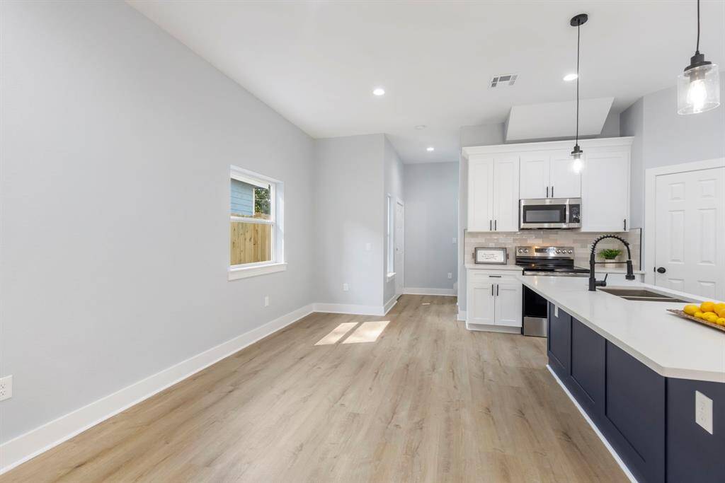 So much space to add an extra long dining table.