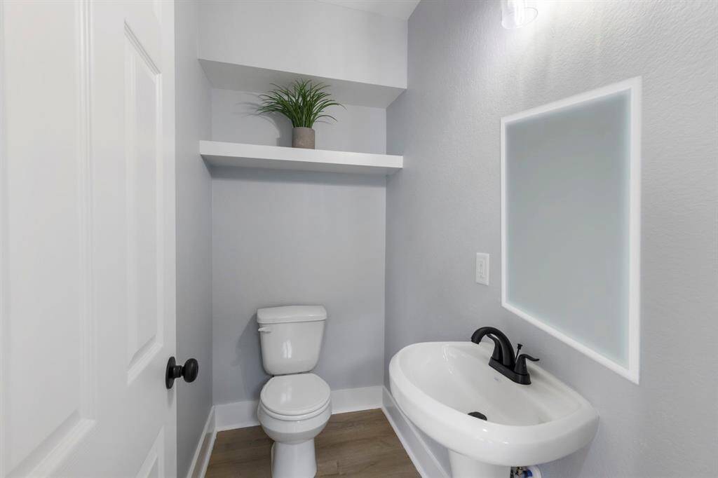 Half Bath conveniently located downstairs.