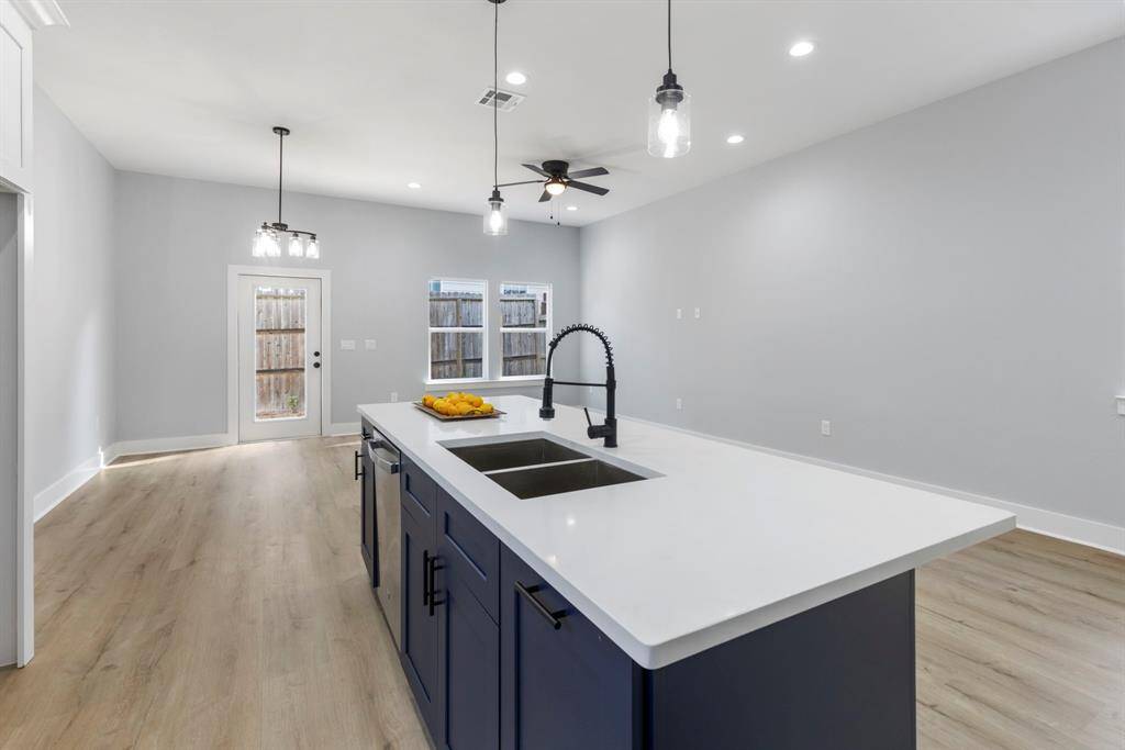 The expansive island offers tons of space for entertaining!