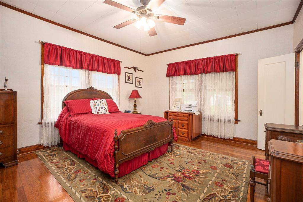 PRIMARY BEDROOM WITH LOTS OF BEAUTIFUL NATURAL LIGHT.  IT HAS 2 CLOSETS AND ONE IS CEDAR LINED!