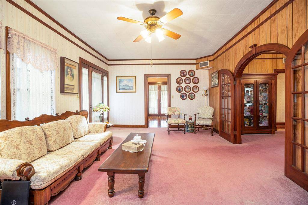 LOOK AT ALL THE DETAILED ORIGINAL BASEBOARDS, TRIM & DOORS, WITH THEIR BEAUTIFUL GLASS KNOBS