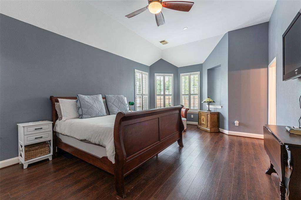 Oversized primary bedroom overlooks the pool!