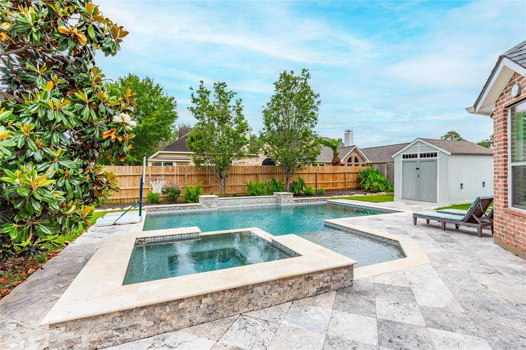 gorgeous pool with travertine surround