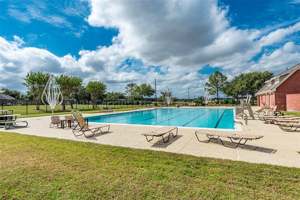 One of two pools in the neighborhood that also features a gym, clubhouse, private golf course and more