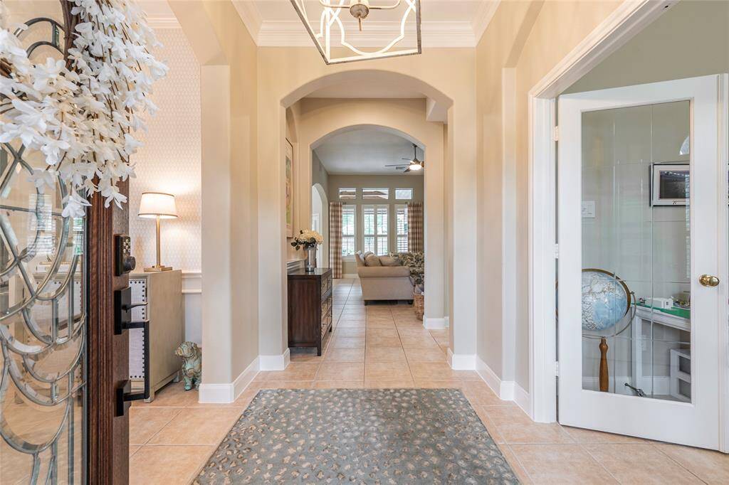 beautiful entry area with study to the right and formal dining to the left