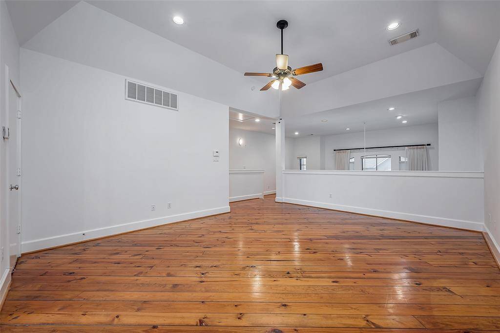 Huge primary bedroom (19X14) with pine flooring