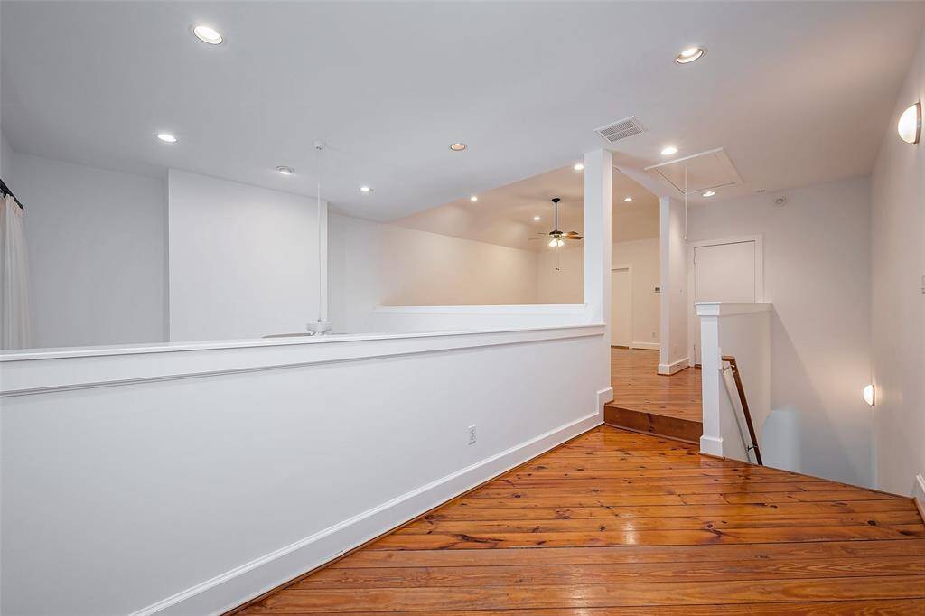 There is a study (10X6) off of the primary bedroom with pine flooring.