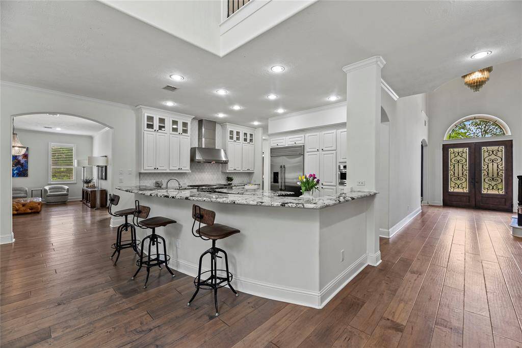 Entertaining is a breeze with an open-concept kitchen and living area. Whip up appetizers for your guests in your air-fryer or enlist their help to bake several dozen cookies for the upcoming charity bake-sale!