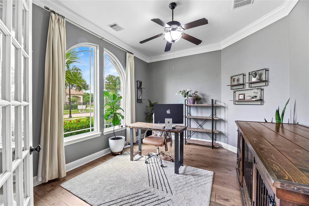 Sequestered with French doors, the 1st floor office may be utilized for telecommuting or running a successful online business. For those continuing their education, it may also serve as a distance learning area and study.