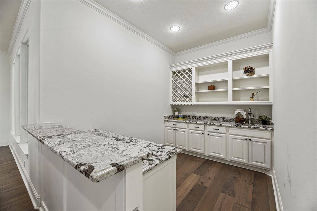 While entertaining in the family room, take advantage of the built-in wet bar! Mix cocktails for friends, pour a glass of red wine for your sweetheart, and intentionally and happily enjoy their company!